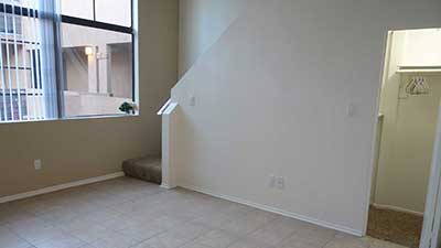 Broadway Apartments living room and under stair closet